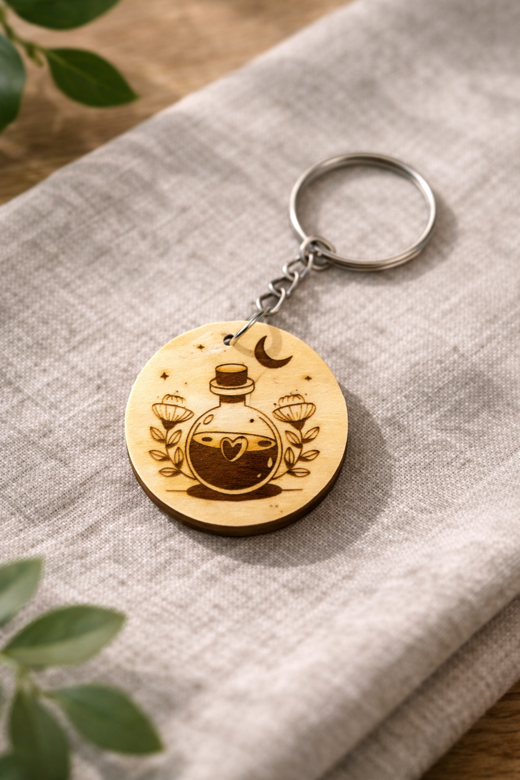 Porte-clés 35mm en bois élégant de la marque Le Bois Élégant, montrant un porte-clés en bois avec boucle métallique.