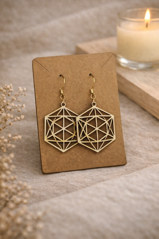 Boucles d'oreilles en géométrie sacrée de la marque Le Bois Elégant, avec motifs géométriques élégants en bois naturel.