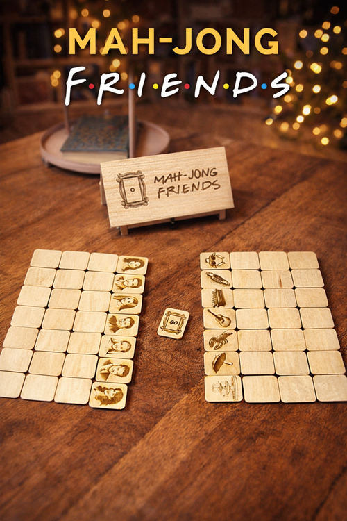Jeu de mah-jong Duo de la marque Le Bois Elégant avec des tuiles blanches et noires posées sur une table en bois.