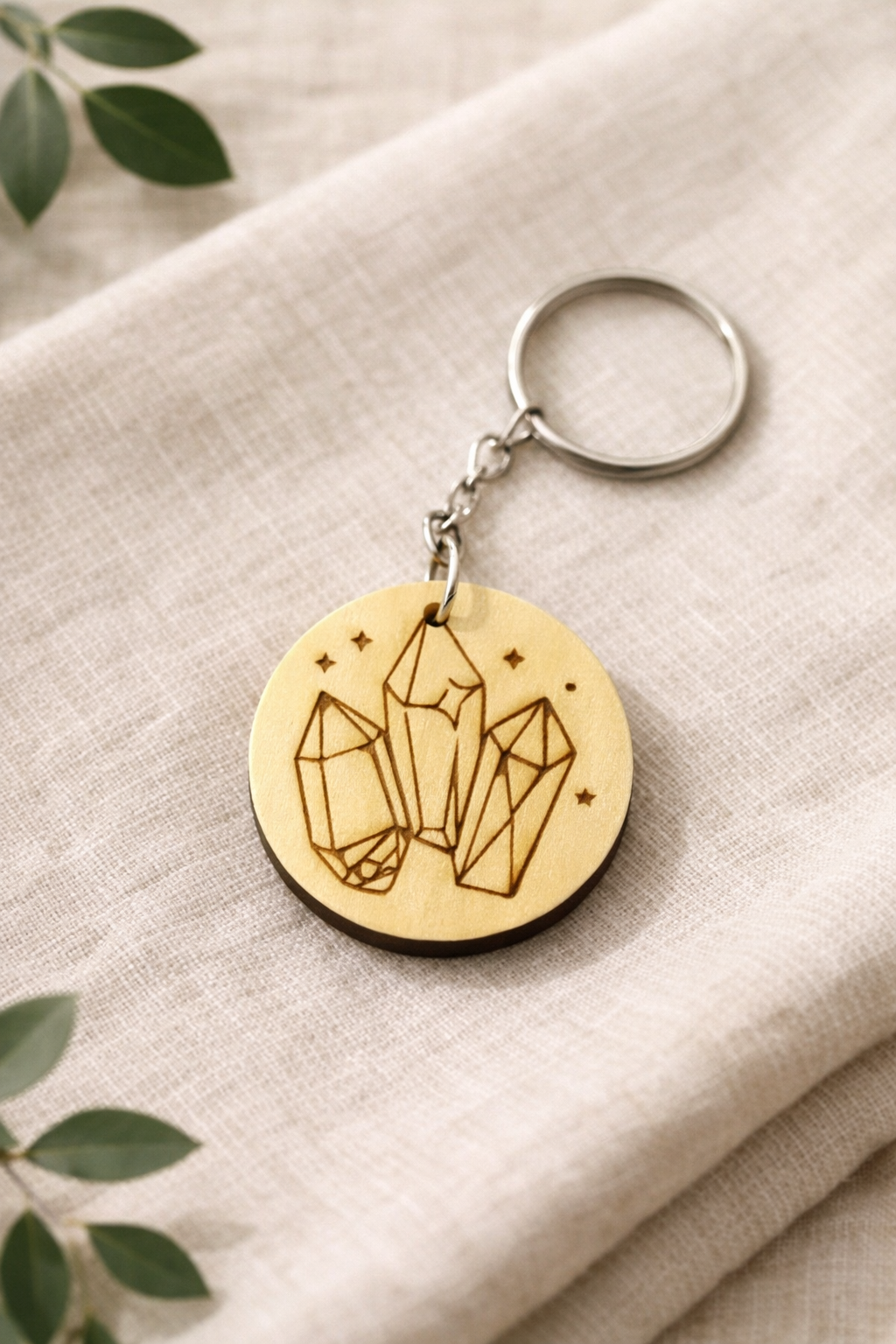 Porte-clés en bois de 35mm de la marque Le Bois Élégant, avec finition lisse et design élégant.