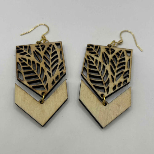Feuillage graphique en bois de la marque Le Bois Elégant, motif moderne et élégant pour décoration intérieure.