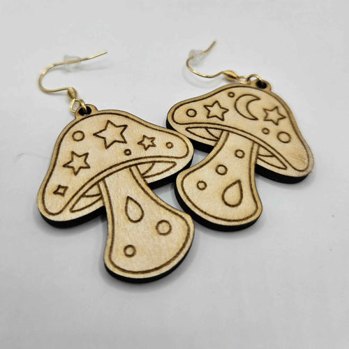 Boucles d'oreilles Champi en bois Le Bois Elégant, motif de champignon sculpté, finition élégante et naturelle.