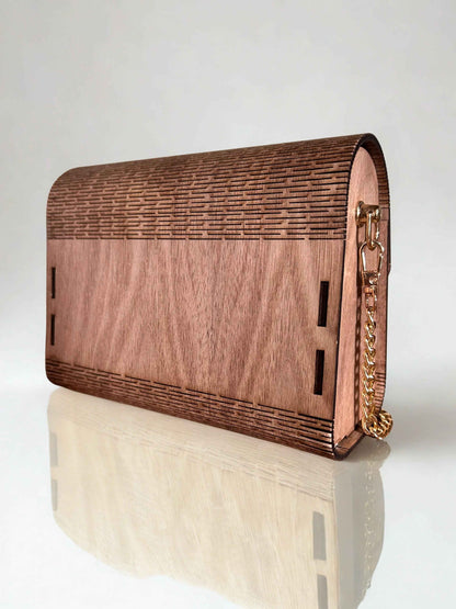 Charmeur en bois élégant de la marque Le Bois Élégant, finition lisse avec détails raffinés.