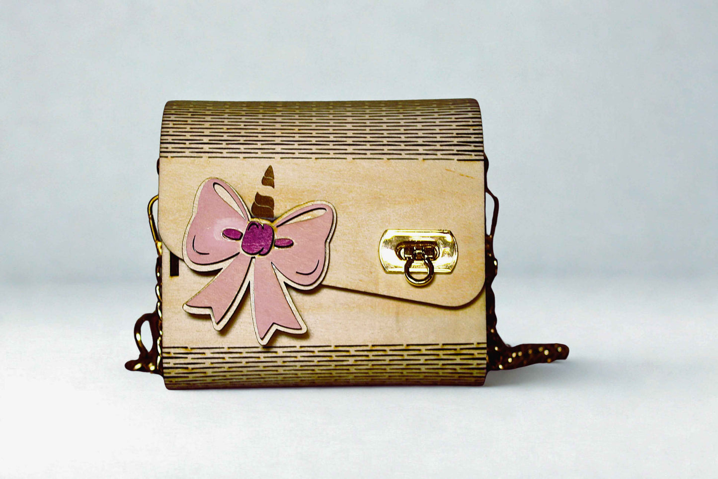 Sac pour bébé fille Le Bois Elégant en tissu doux avec poignées confortables, devant du sac avec logo élégant.