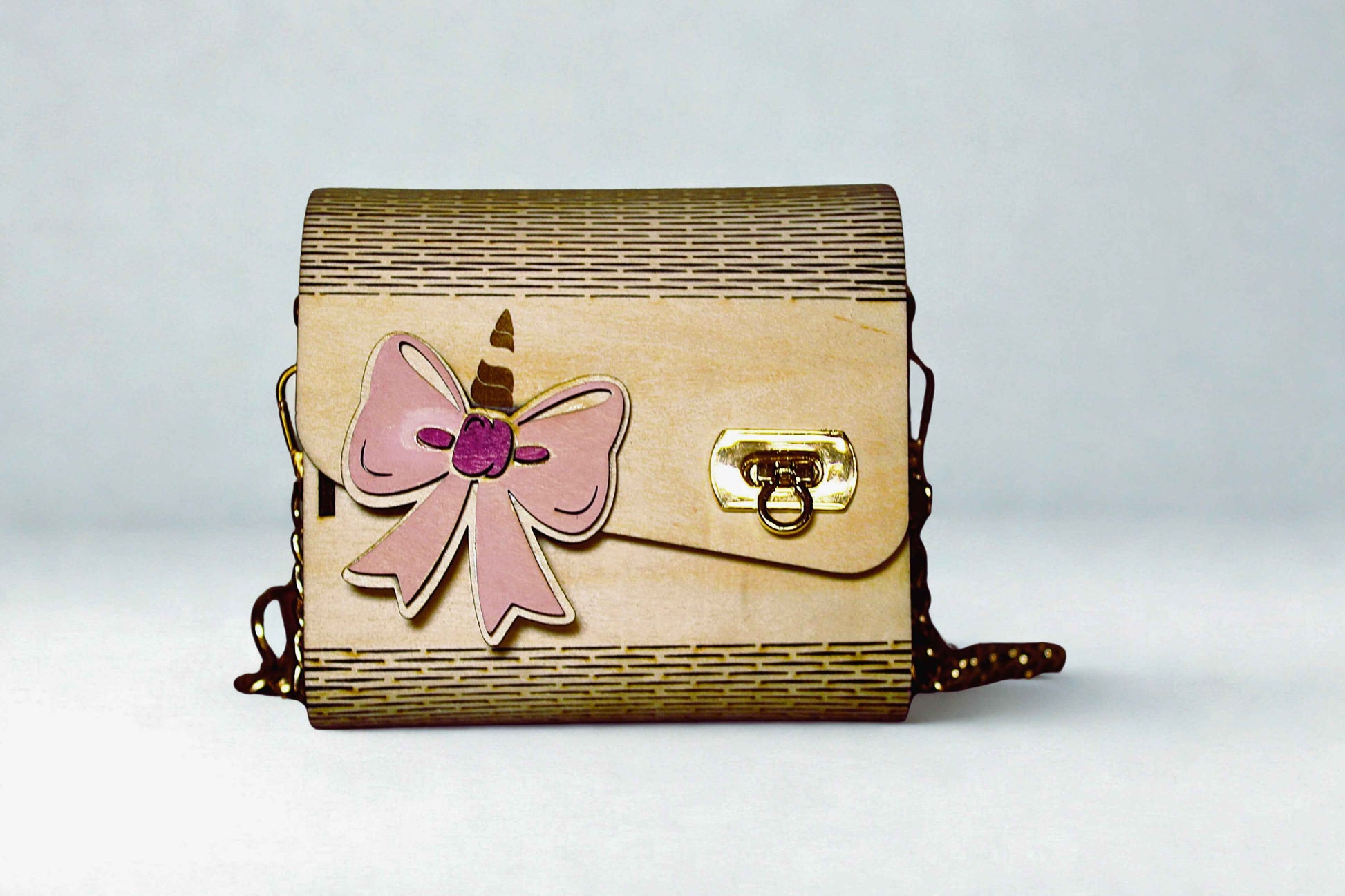 Sac pour bébé fille Le Bois Elégant en tissu doux avec poignées confortables, devant du sac avec logo élégant.
